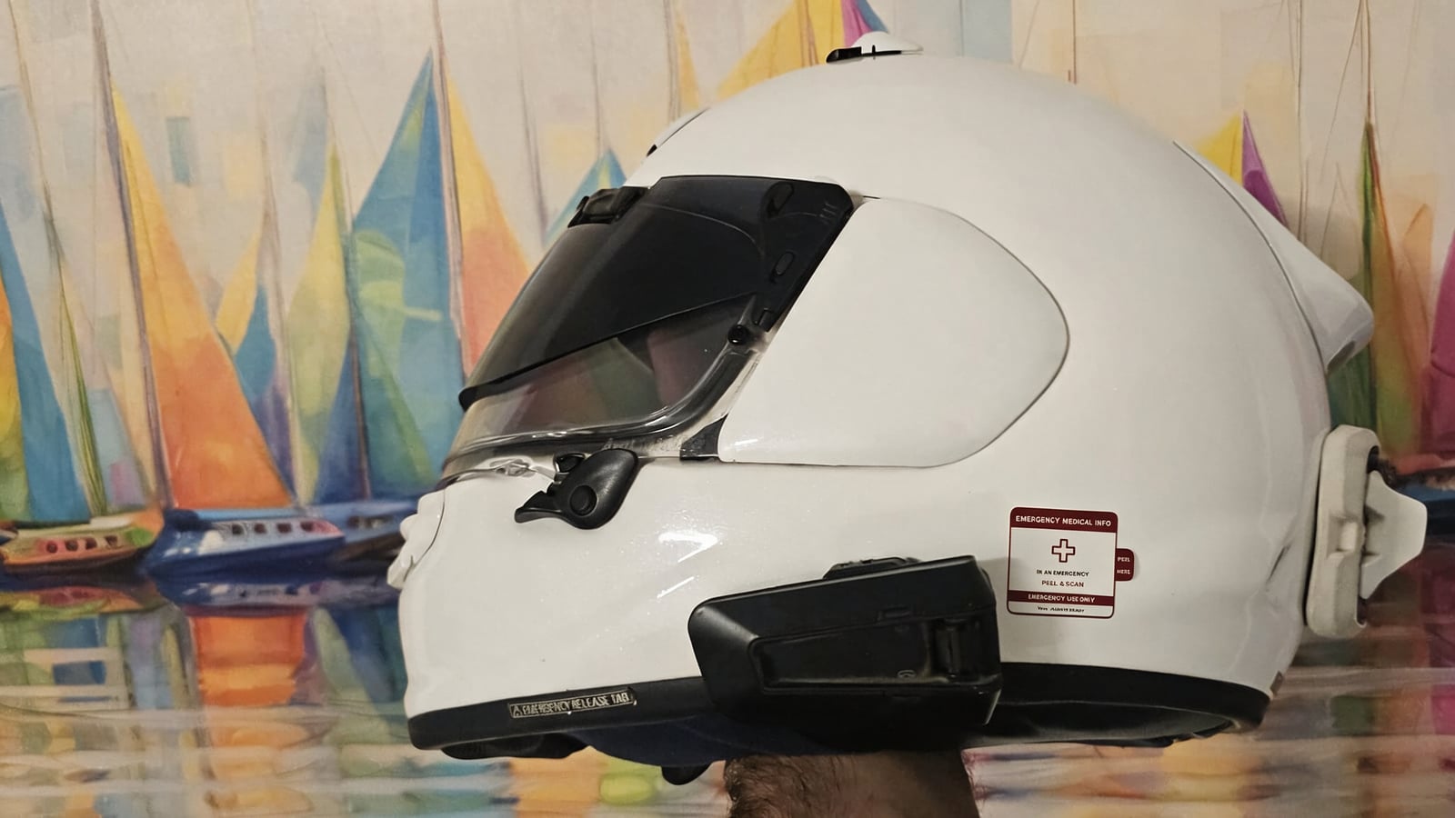 White helmet with a Vera emergency medical sticker
